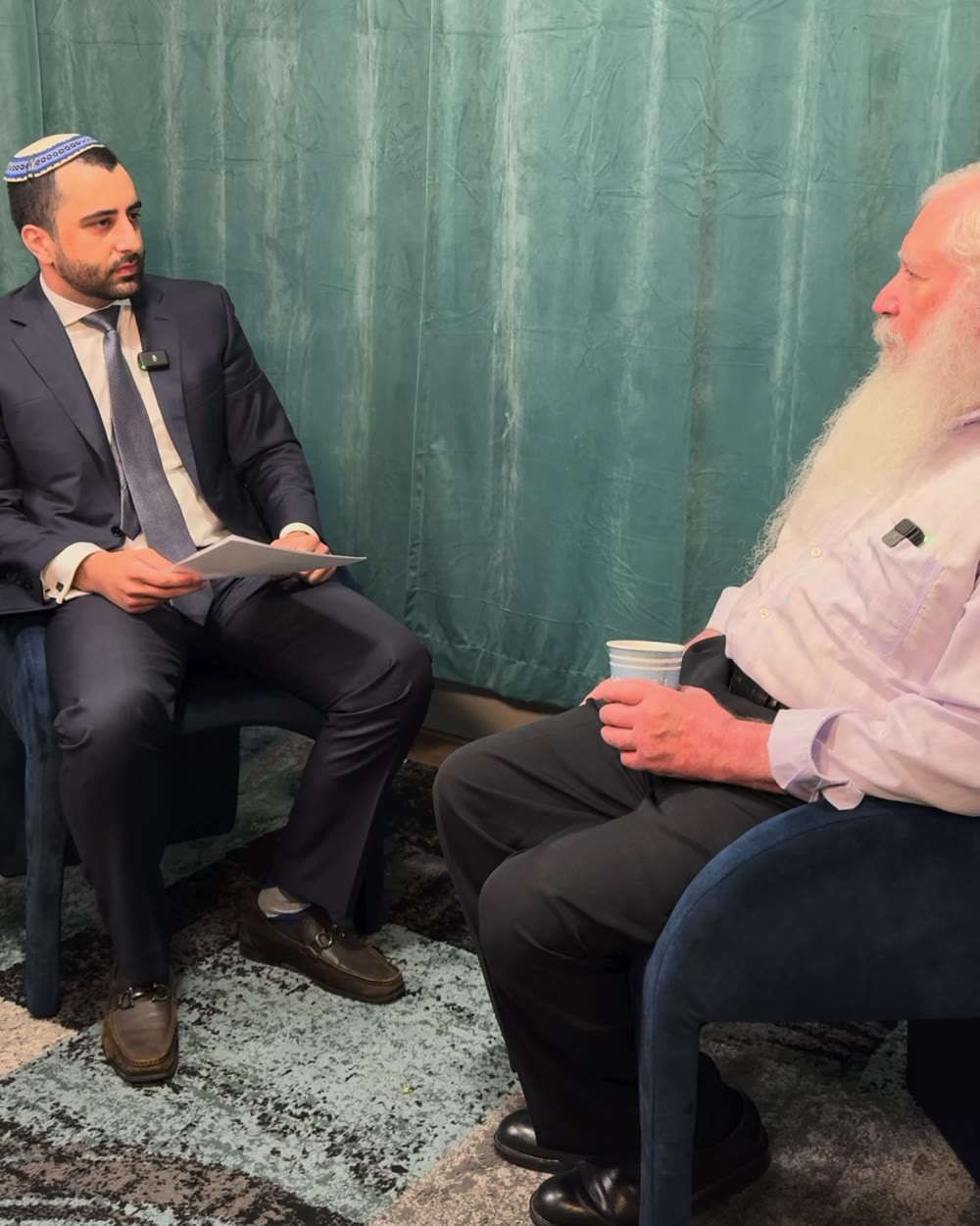 Bechor Mosheyev interviewing a guest on set